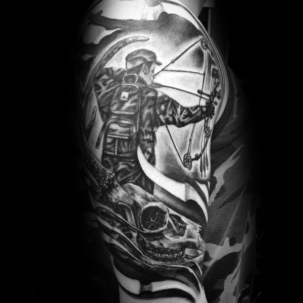 Realistic black and grey tattoo of a bowhunter aiming with a compound bow above a detailed deer skull, blending nature and hunting themes.