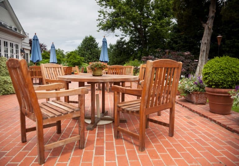 red brick patio with outdoor dining set
