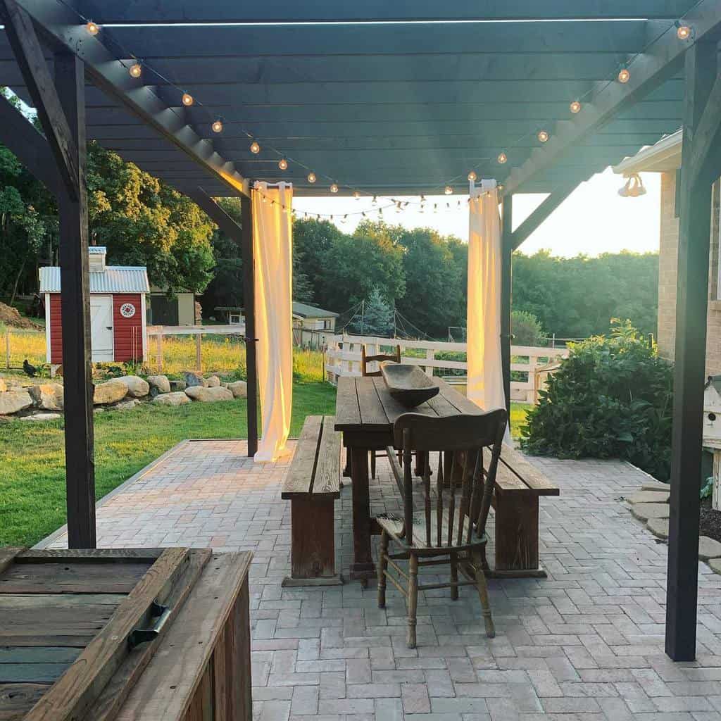 outdoor patio fairly lights wood table and chairs