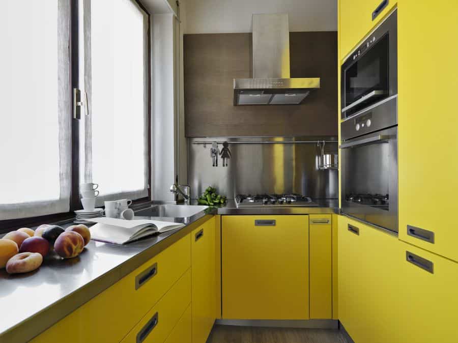 bright yellow cabinets modern galley kitchen
