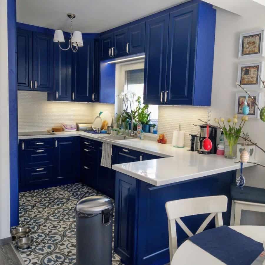blue cabinets white granite countertop country kitchen