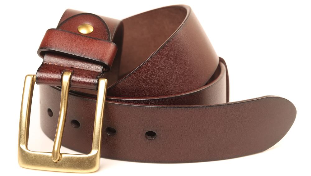 brown belt close up on white surface