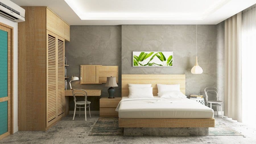 Modern bedroom with built-in desk, natural wood accents, and minimalist decor.