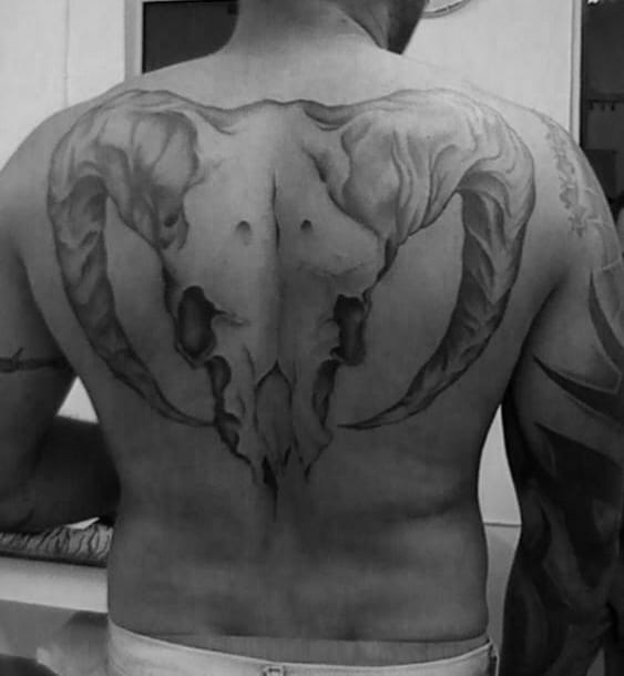 Bull Head Skull Tattoo On Mans Back