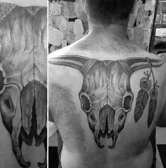 Bull Skull With Two Feathers Male Back Tattoo