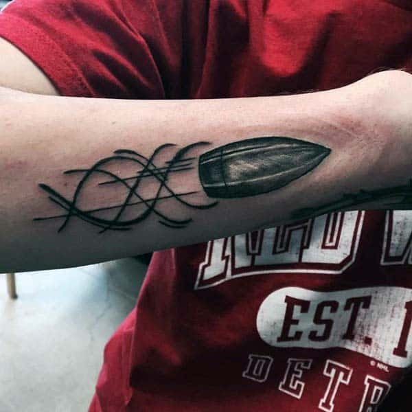 Bullet Soaring Through The Wind Mens Tattoo On Forearm