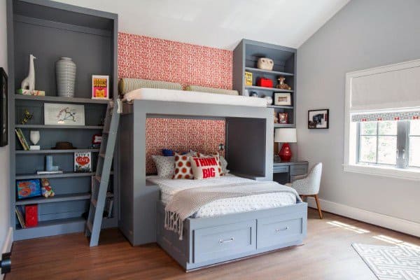 Modern bunk bed design with a built-in desk, shelves, and storage drawers, featuring a stylish gray and red theme