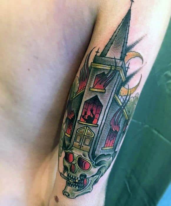 Burning church tattoo with red flames and stained glass windows. The steeple transforms into a skull with glowing red eyes at the base.