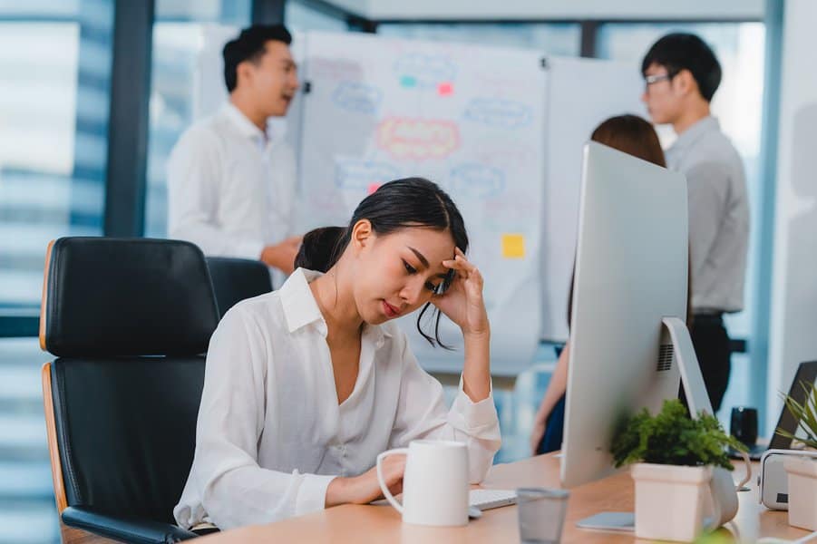 businesswoman working stress out with project research problem