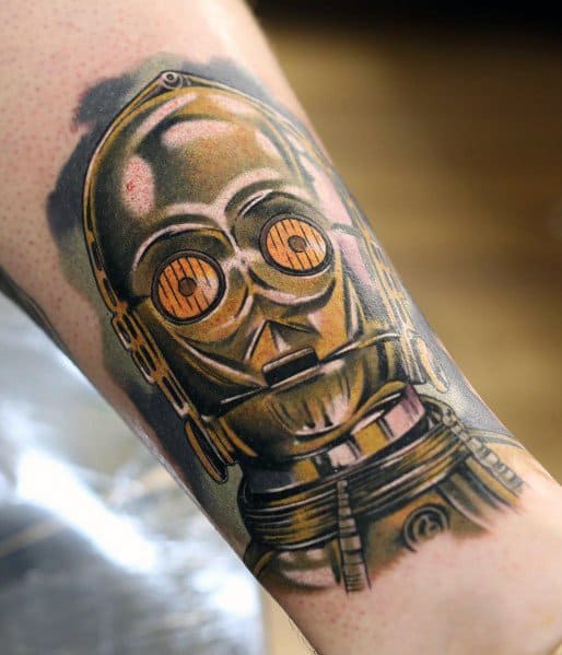 Realistic C-3PO tattoo with metallic highlights and detailed shading, giving the droid a lifelike, three-dimensional appearance.