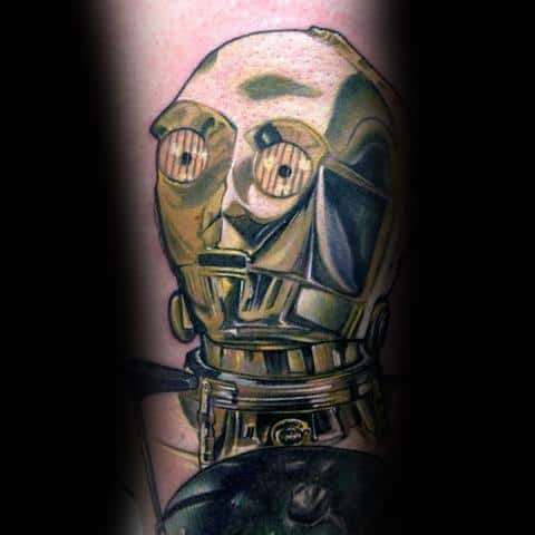 Detailed C-3PO tattoo with metallic gold tones and realistic shading, capturing the droid’s expressive look in a lifelike design.
