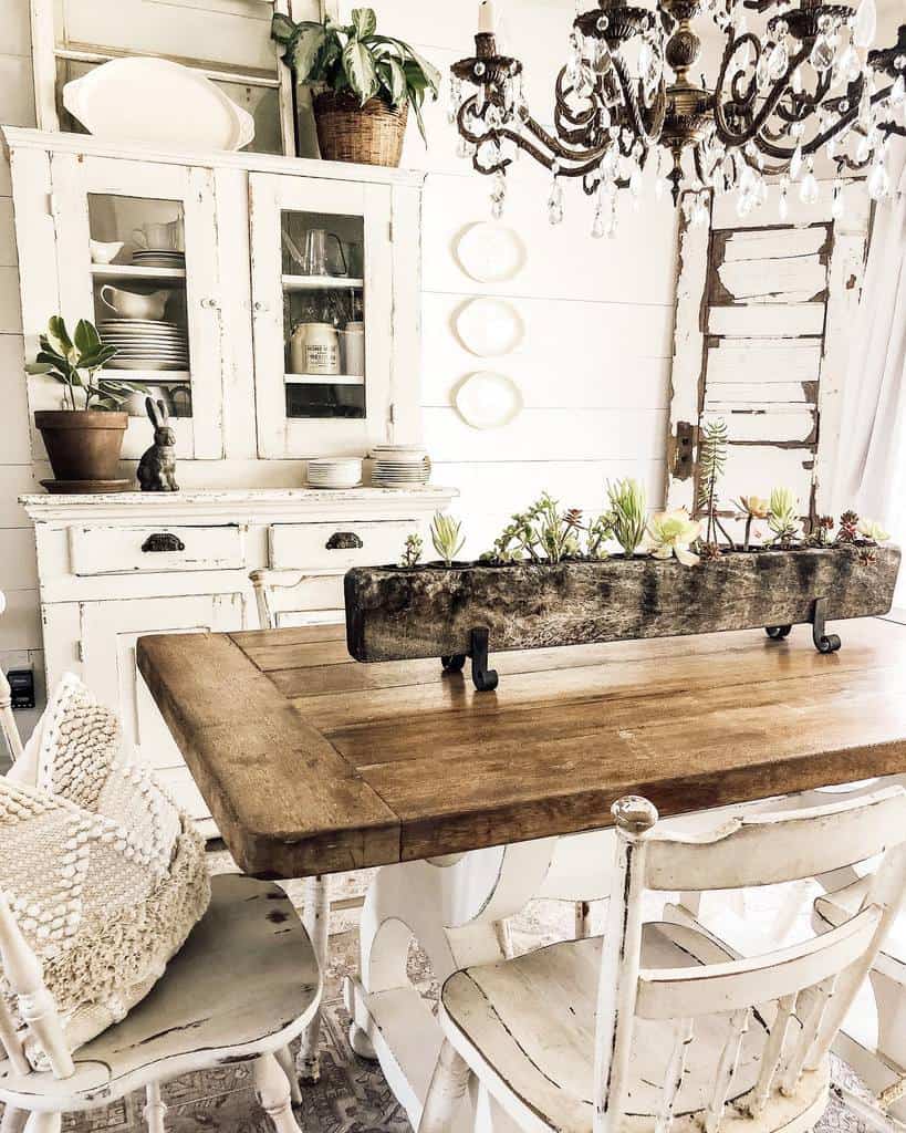rustic dining room white wood cabinet wood table with planter