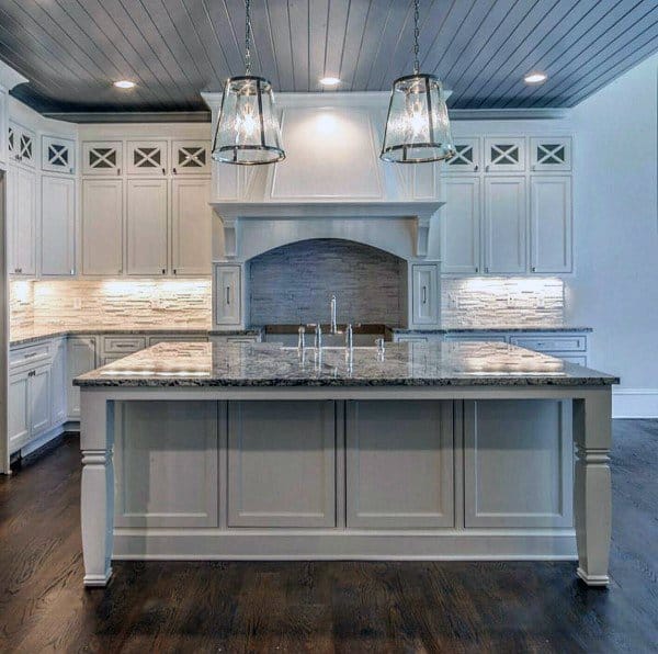 large white cabinet kitchen with granite countertop 