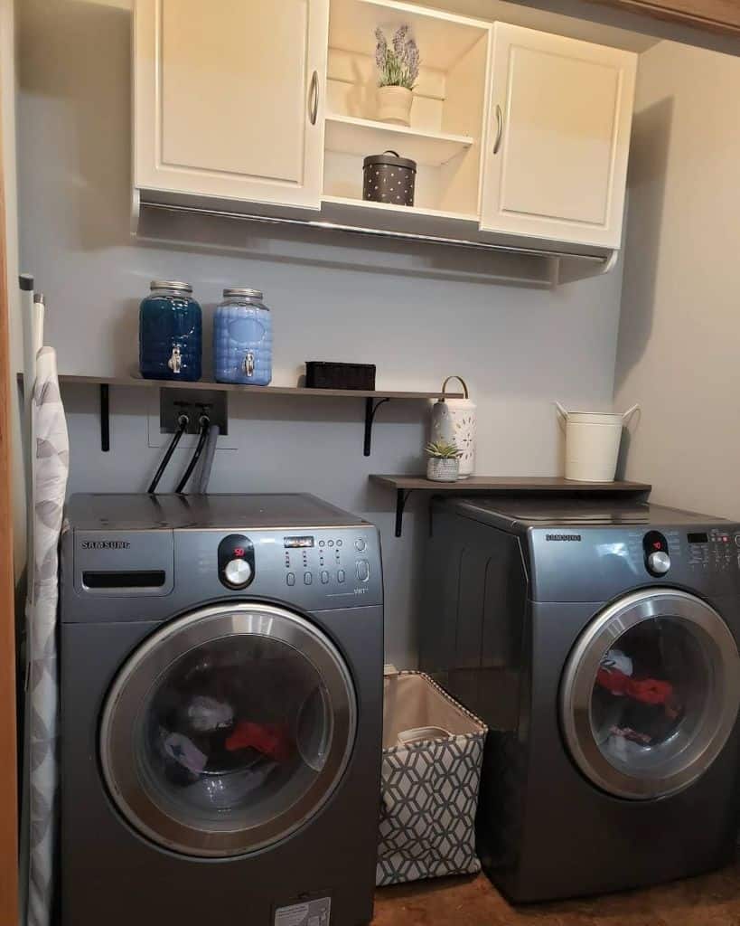 white wall cabinet laundry closet 