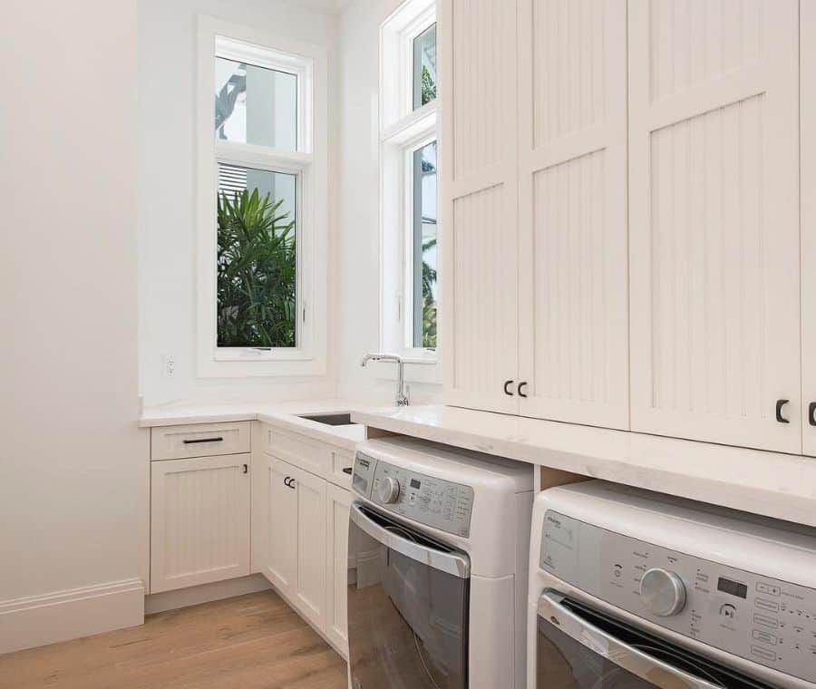 large white cabinet laundry room washer and dryer