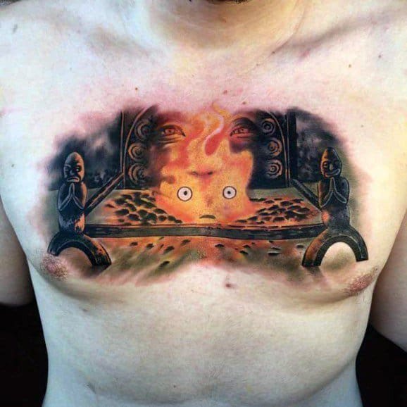 Large chest tattoo featuring Calcifer at the center of a fiery scene with symmetrical statues, glowing eyes, and surreal background elements.
