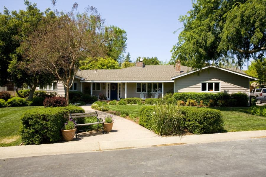 large front yard ranch-style house