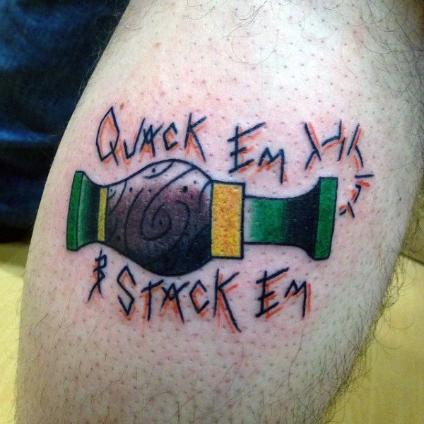 Color tattoo of a duck call with the phrase Quack Em & Stack Em in stylized lettering, radiating energy and motion lines.