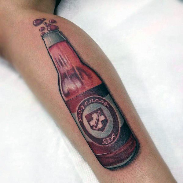 Vibrant Call of Duty Perk-a-Cola tattoo on the forearm, featuring a detailed red soda bottle with bubbles and a classic game-inspired logo.