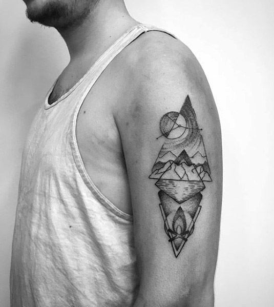 Geometric blackwork tattoo with a campfire, mountain landscape, moon, and celestial elements stacked in symmetrical shapes.