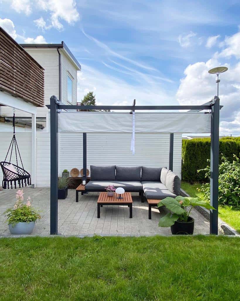 canvas patio shade with l-shape sofa