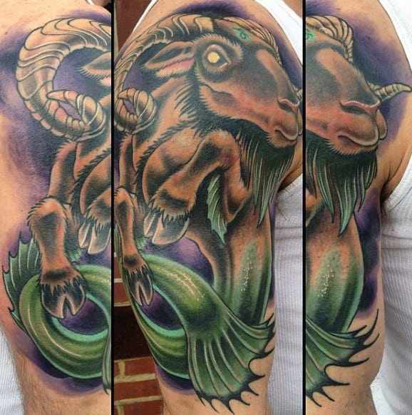 Capricorn Sea Goat Mens Upper Arm Tattoo With Purple Watercolor Background