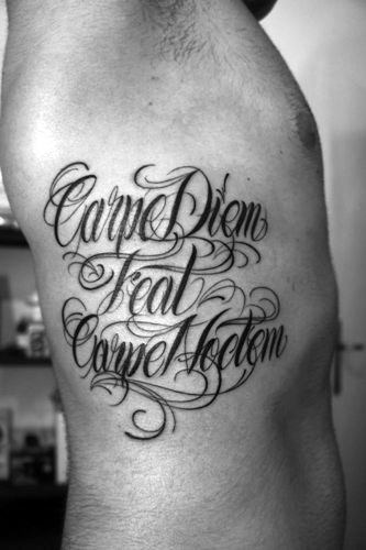 Carpe Diem Carpe Noctem Tattoo On Mans Ribs