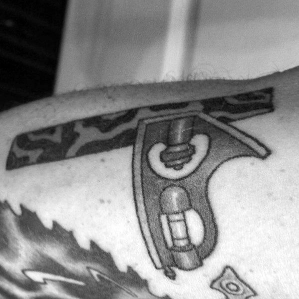 Black and gray tattoo of a combination square, symbolizing precision, measurement, and dedication to craftsmanship and woodworking.