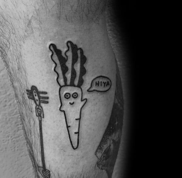 Minimalist black ink carrot tattoo with a cute face, bold leafy top, and a speech bubble saying "Hiya" for a fun and playful design.