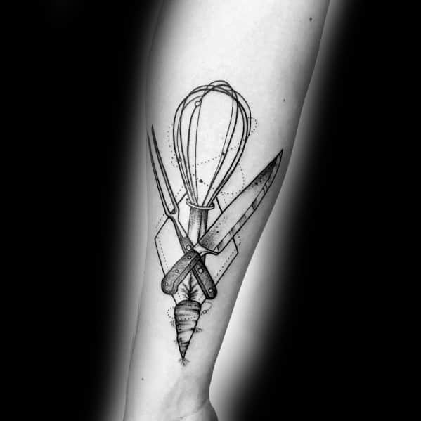 Black and gray tattoo featuring a geometric carrot fused with a whisk, knife, and fork, creating a bold and artistic culinary-inspired design.