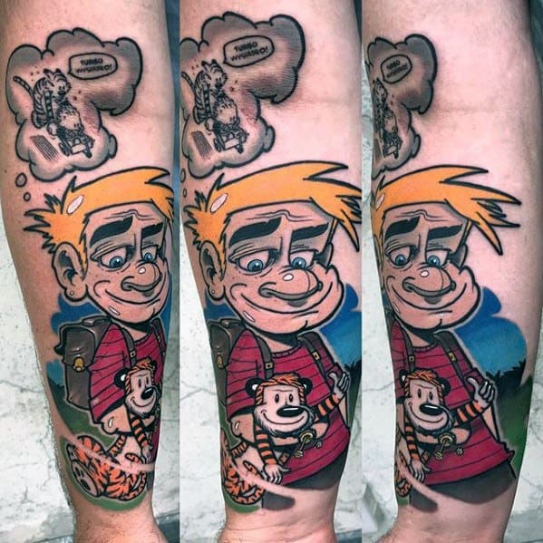 Colorful Calvin and Hobbes tattoo showing Calvin smiling with Hobbes in hand and a nostalgic comic-style thought bubble above.