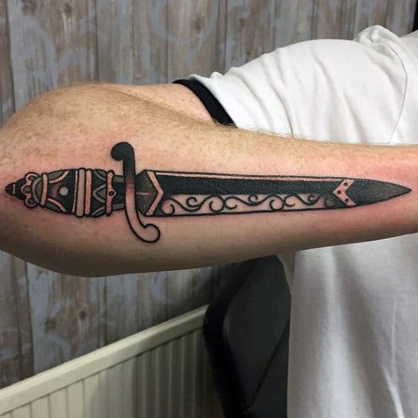 Carved Dagger Tattoo For Guys On Outer Forearm