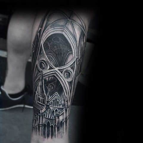 Cathedral leg tattoo featuring gothic arches, vaulted ceilings, and detailed spires with strong black and grey shading.