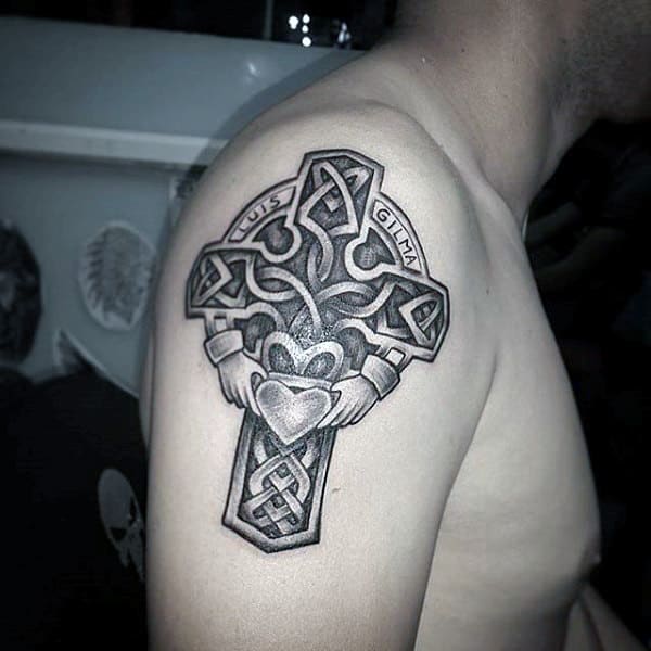 Celtic Cross With Claddagh Guys Tattoo Black And Grey Ink Shaded On Upper Arm