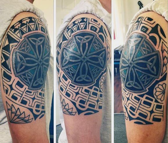 Intricate black and grey geometric tattoo sleeve on upper arm with Celtic design