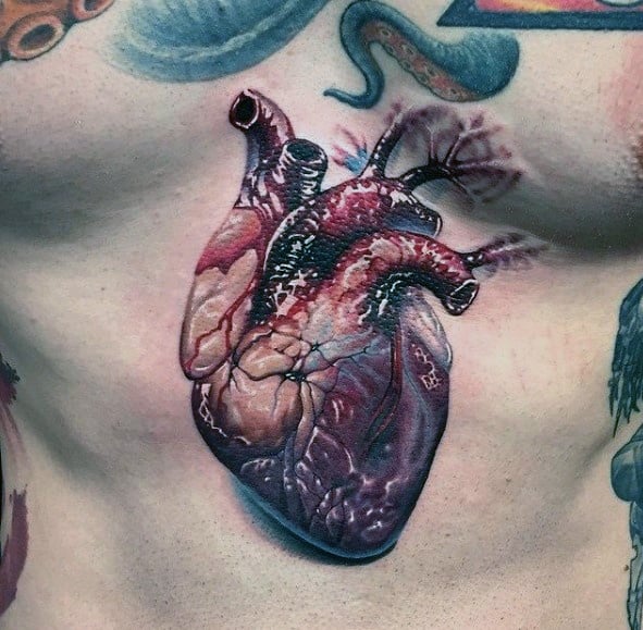 Realistic 3D tattoo of an anatomical heart on the chest, featuring lifelike veins, shading, and highlights for a bold and detailed design.