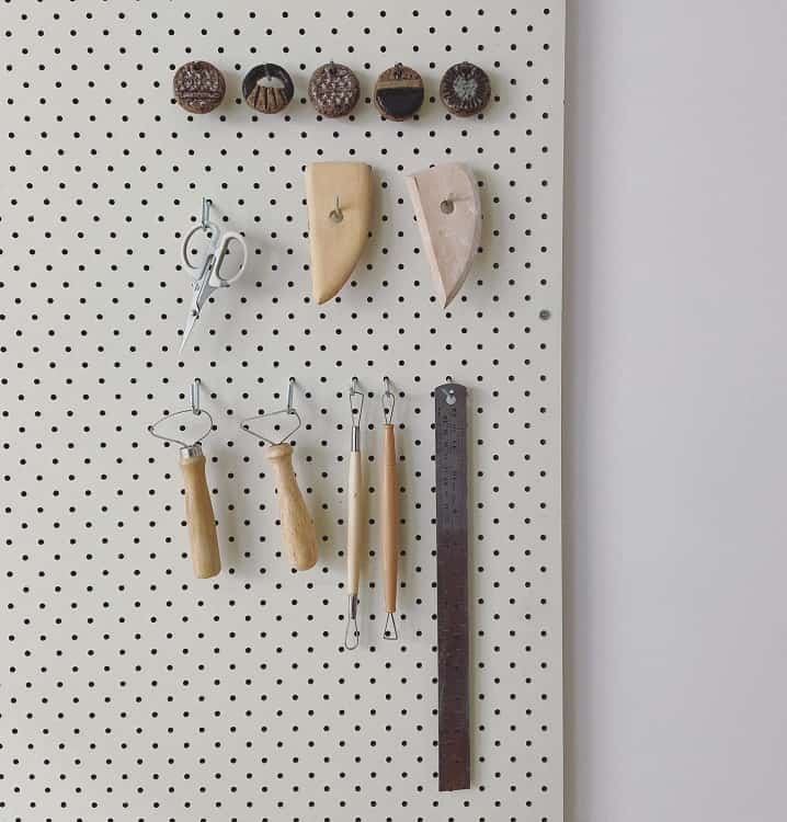 ceramic studio workspace pegboard