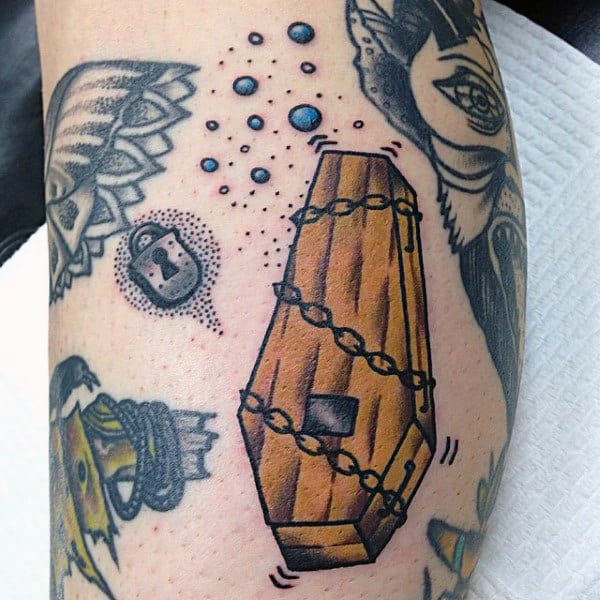 Chained Coffin Tattoo On Bicep For Men