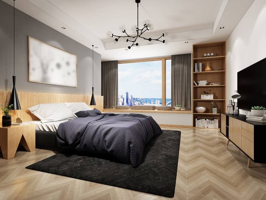 Modern apartment bedroom with city view, minimalist decor, and sleek lighting fixtures.