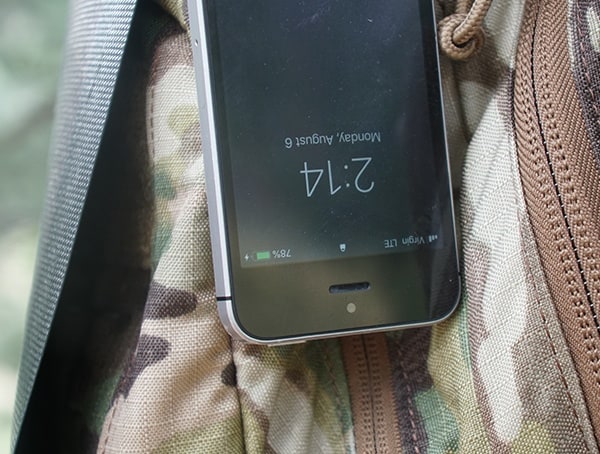 Charging Iphone With Sunsoaker On Backpack