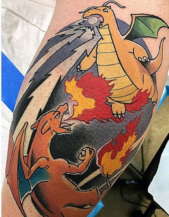 Charizard and Dragonite locked in an intense battle tattoo, with fire and energy blasts clashing in a dramatic oval frame.