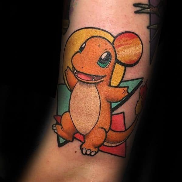 Minimalist Charmander tattoo with bold outlines and geometric shapes, featuring a sunset-colored ear and playful pose on forearm.