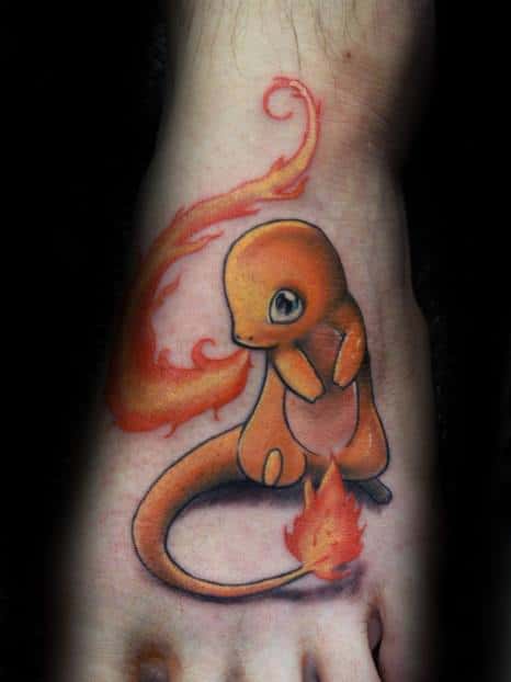 Emotional Charmander tattoo on foot with a soft, shy expression and flowing tail flame, done in a smooth, painterly style.