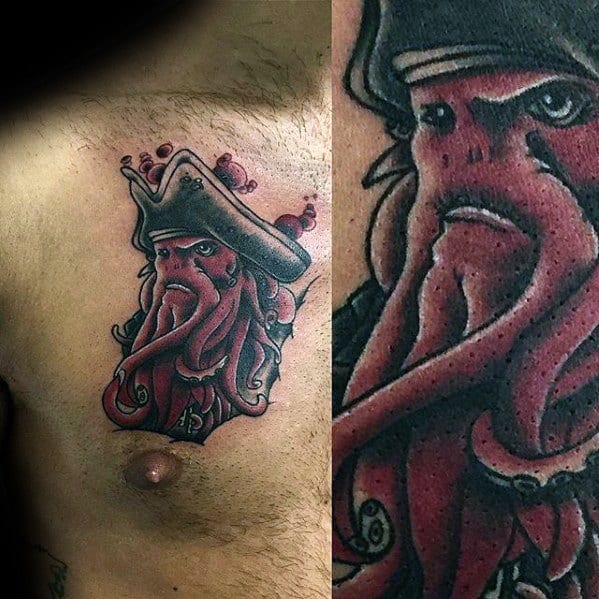 Tattoo of Davy Jones with a tentacle beard on a person's chest