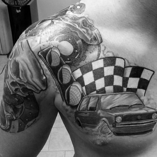 Detailed racing-themed tattoo featuring a checkered flag, traffic lights, and a classic car, symbolizing speed, competition, and passion for motorsports.