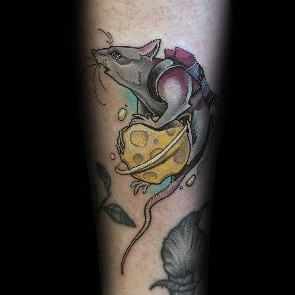 Tattoo of a gray rat with a jetpack clutching a wedge of Swiss cheese, featuring bold outlines, soft shading, and a colorful background.