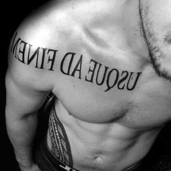 Chest And Arm Latin Tattoo On Men
