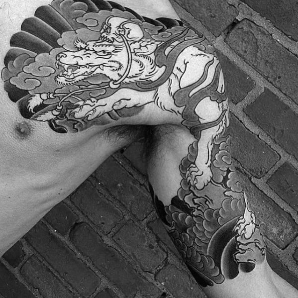 Chest And Arm Male Kitsune Tattoos