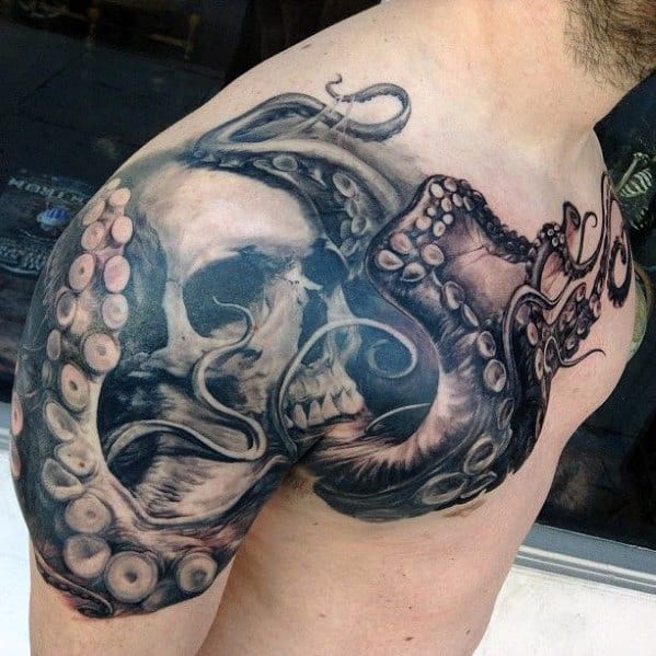 Octopus and skull tattoo on a person's upper arm and shoulder
