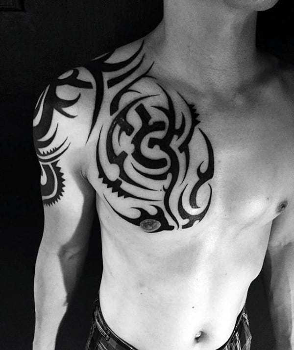 Chest And Shoulder Male Tribal Traditional Tattoos